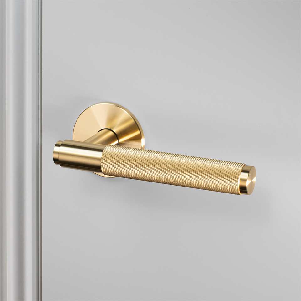 1. BusterPunch Door Handle Right Fixed Brass