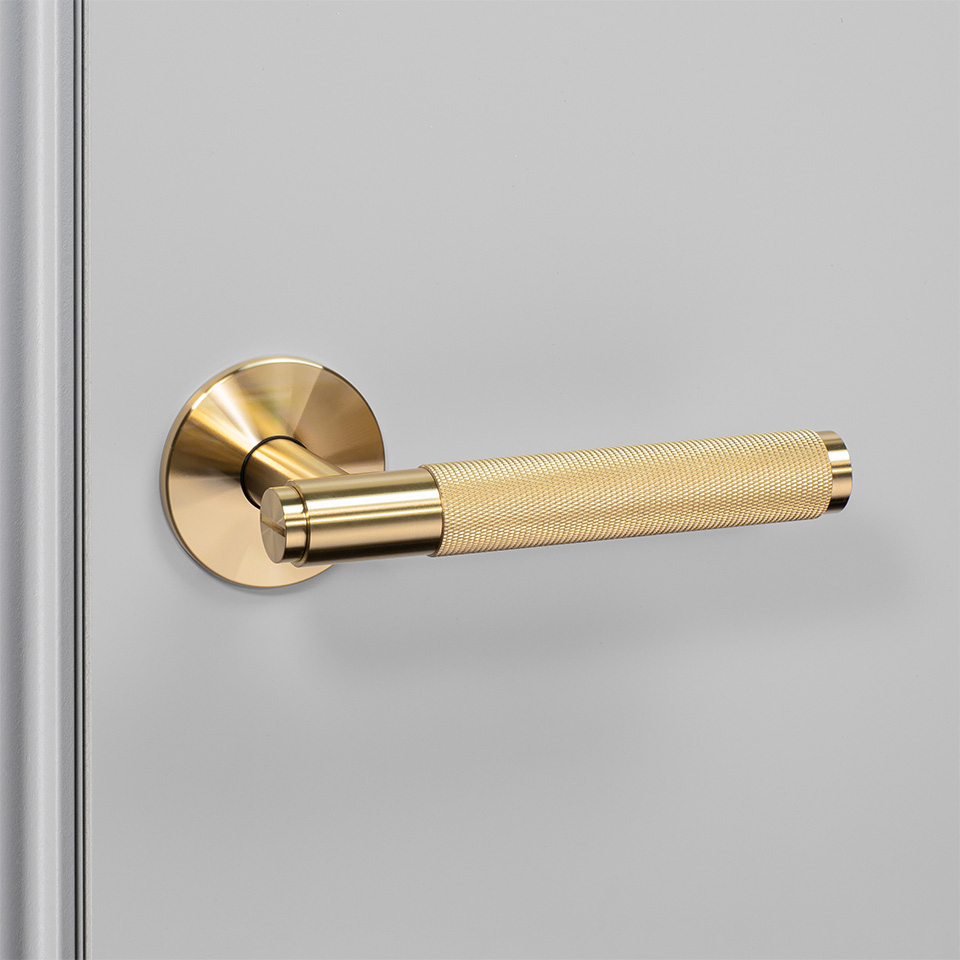 3. BusterPunch Door Handle Left Fixed Brass